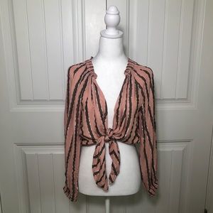 Womens long sleeve light weight open front blouse with a deep v neckline. Small